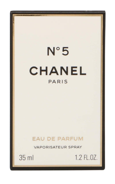 Diverse fragrance collection featuring perfumes, colognes, and body sprays