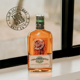 18.21 Man Made Spiced Vanilla 3-in-1 Body Wash in bathroom setting