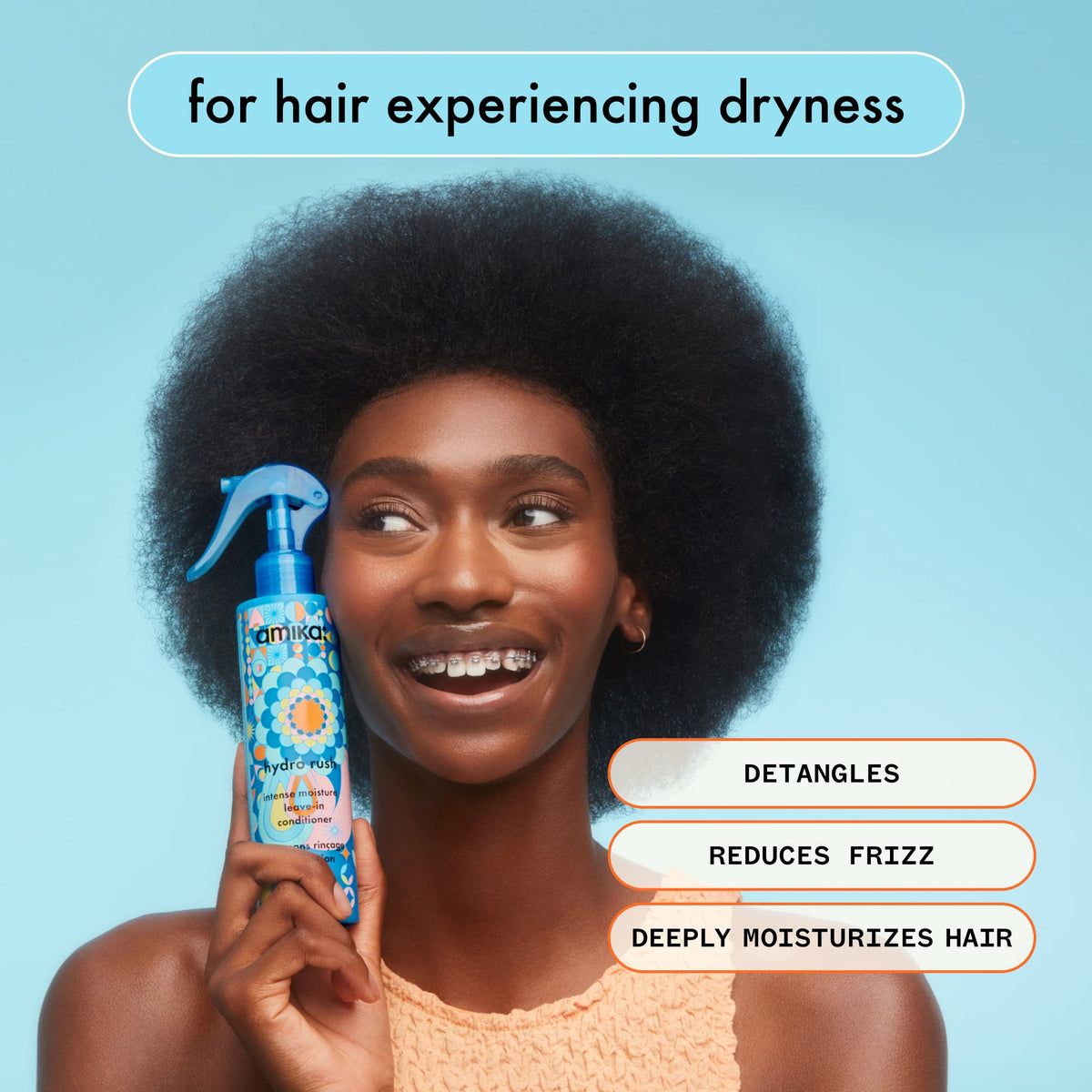 Amika Hydro Rush Leave-In Conditioner in bathroom setting