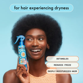 Amika Hydro Rush Leave-In Conditioner in bathroom setting