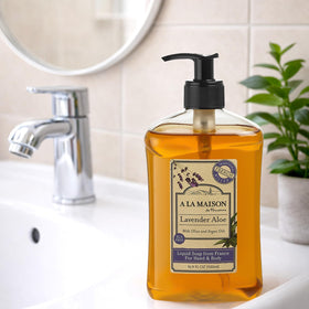A LA MAISON Lavender Aloe Liquid Hand Soap with lavender flowers