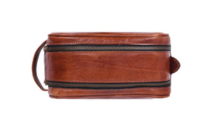 AARON Leather Toiletry Bag lifestyle scene on bathroom counter