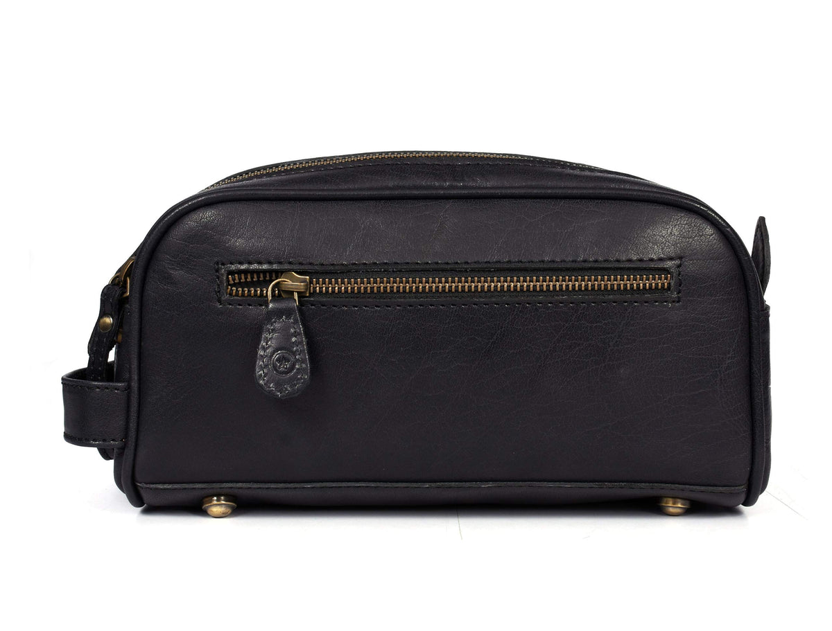 AARON Leather Toiletry Pouch on a travel surface