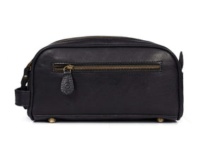 AARON Leather Toiletry Pouch on a travel surface
