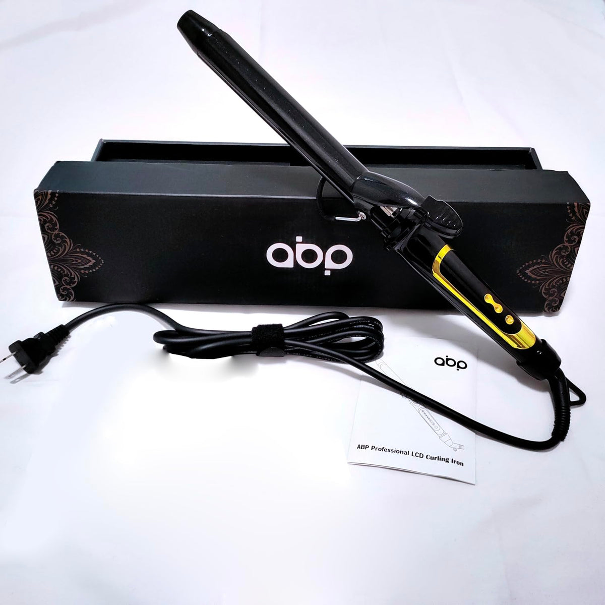 abp curling iron in stylish black and gold design