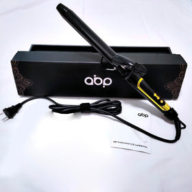 abp curling iron in stylish black and gold design