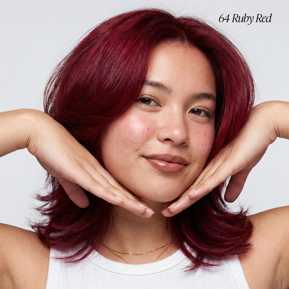 Adore Semi Permanent Hair Color 064 Ruby Red bottle with cap