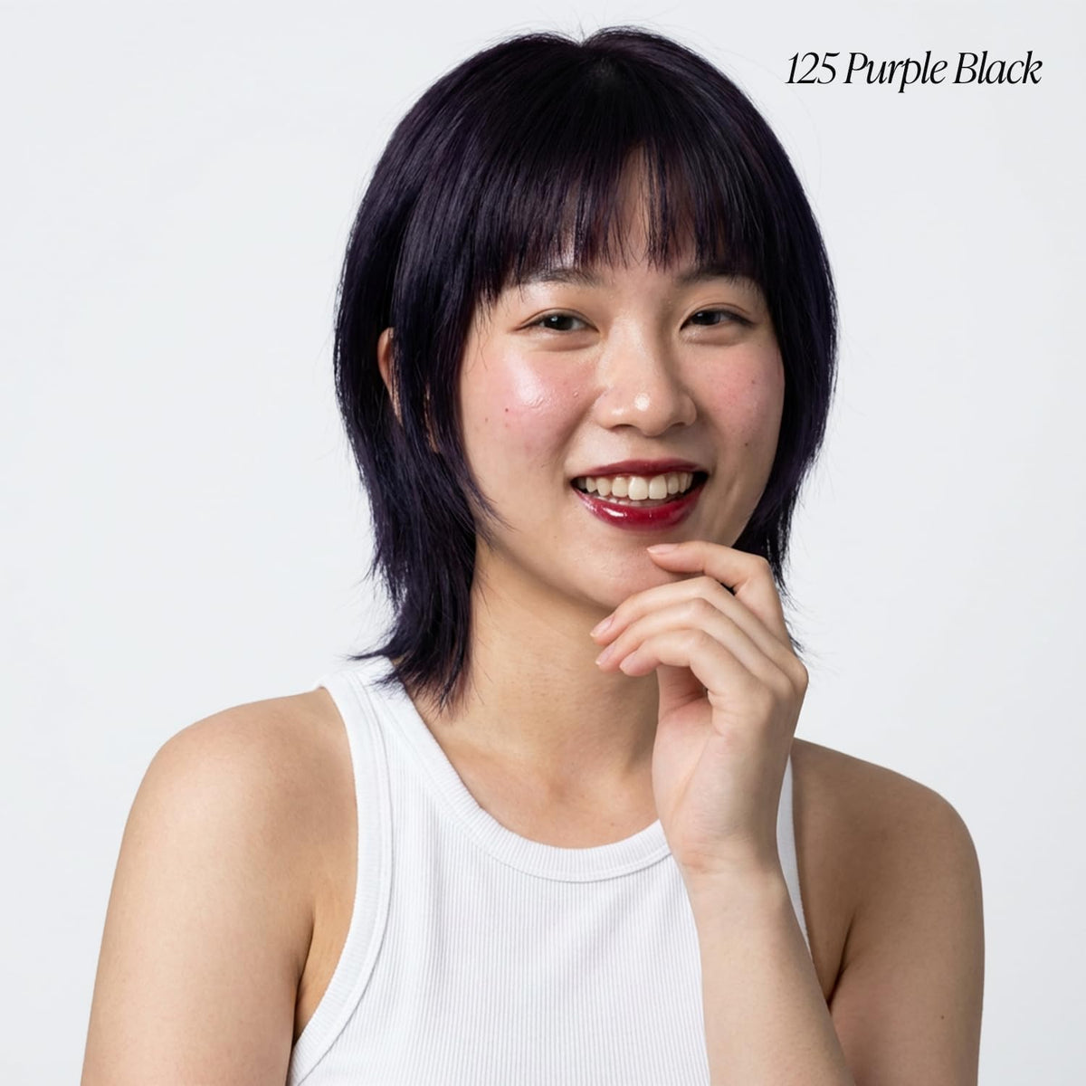 Adore Semi Permanent Hair Color 125 Purple Black bottle close-up