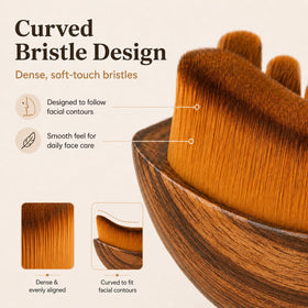 AEKI Lymphatic Contour Face Brush in hand demonstrating usage