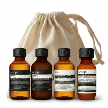 Aesop Arrival Travel Shower Set four-piece kit with reusable canvas bag