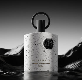 Afnan Supremacy Collector's Edition bottle with floral background