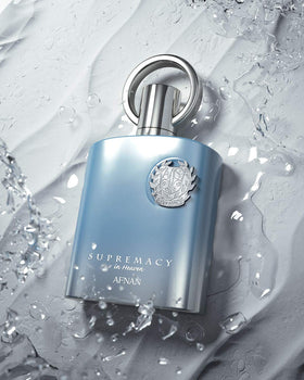 Afnan Supremacy In Heaven Eau De Parfum on a wooden table