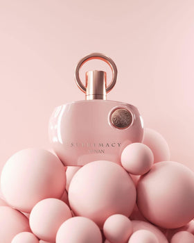 Afnan Supremacy Pink Eau De Parfum with floral background