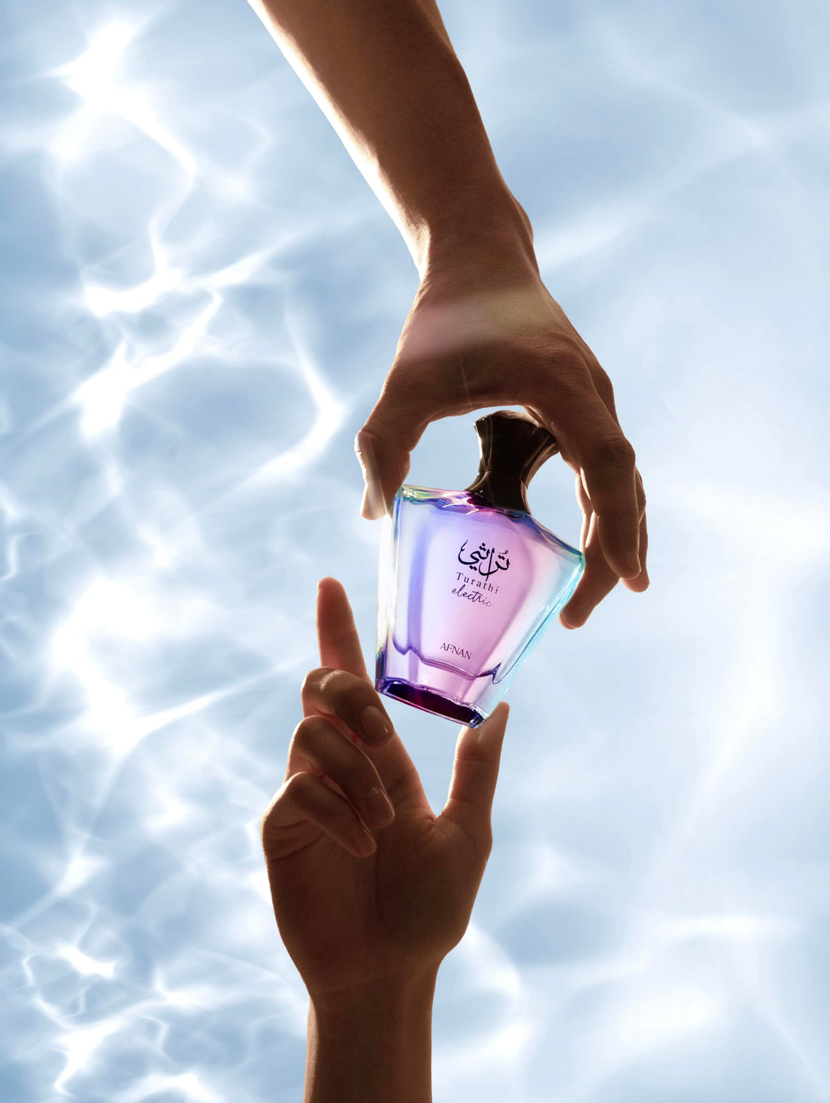 Afnan Turathi Electric Eau de Parfum bottle with soft lighting