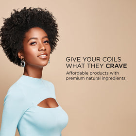 African Pride Moisture Miracle oils being applied to hair