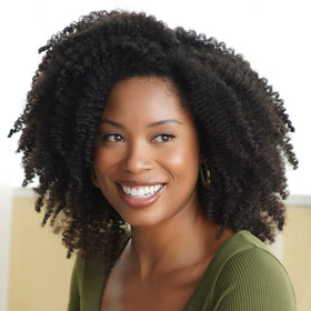 African Pride Moisture Miracle Pre-Shampoo Detangler on bathroom shelf