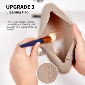 AGIKET Soft Silicone Makeup Brush Holder in blue on a vanity