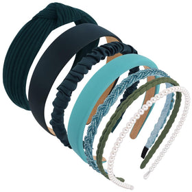 AHONEY headbands in neutral colours displayed on a flat surface