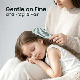 AIMIKE Detangler Hair Brush with high-resilience bristles close-up