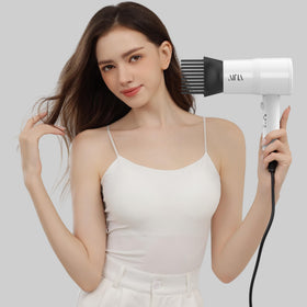Aina Hair Dryer in use, styling hair