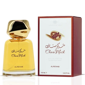 Al-Rehab Choco Musk Eau de Parfum bottle on a wooden table