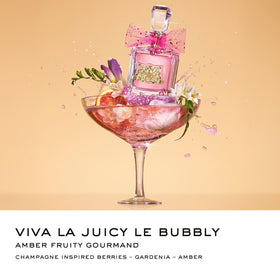 All four fragrances from Juicy Couture gift set displayed together