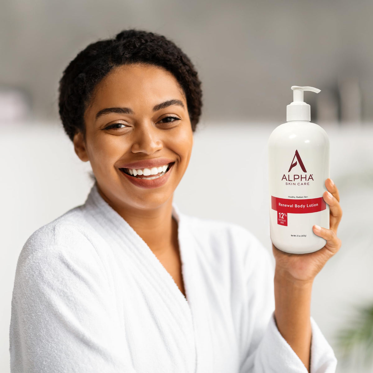 Alpha Revitalizing Body Lotion on a bathroom counter
