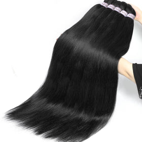 Alrence braiding hair being dipped in hot water for styling