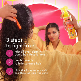 Amika Frizz-Me-Not Hydrating Anti-Frizz on a bathroom counter