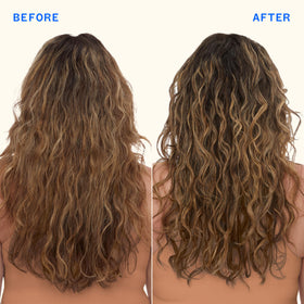 Amika Hydro Rush Leave-In Conditioner on a bathroom shelf