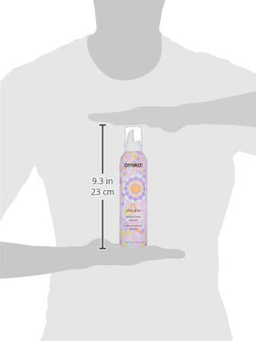 Amika mousse on vanity with other styling products