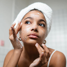 Ammoya Naturals Turmeric Skin Cleansing Soap in a bathroom setting