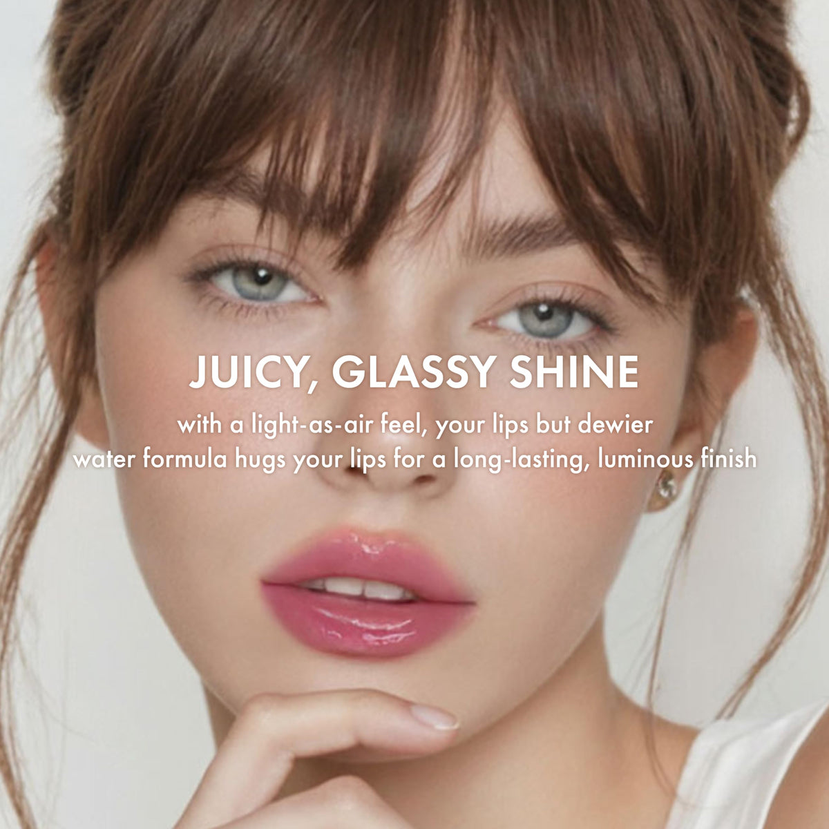 Amuse Daisy Flower Dew Tint in use on model