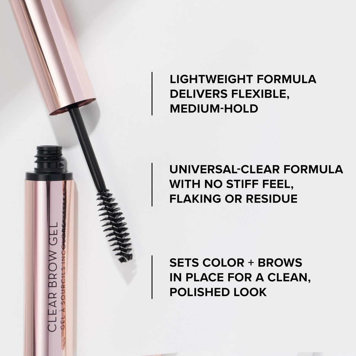 Anastasia Beverly Hills Clear Brow Gel in hand with natural background