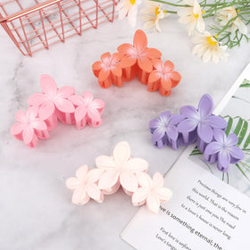 ANBALA Flower Claw Hair Clip in a vibrant purple colour