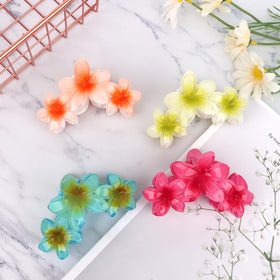 ANBALA Flower Hair Clip worn by a model outdoors