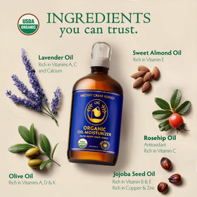 Ancient Greek Remedy Organic Body & Face Oil 8oz pouring into hand