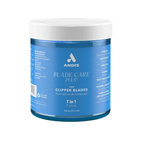 Andis Blade Care Plus Disinfectant 16.5-Ounce with clippers on a countertop