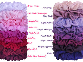 AnnushkaHomeDecor Bright White Scrunchie on a wrist