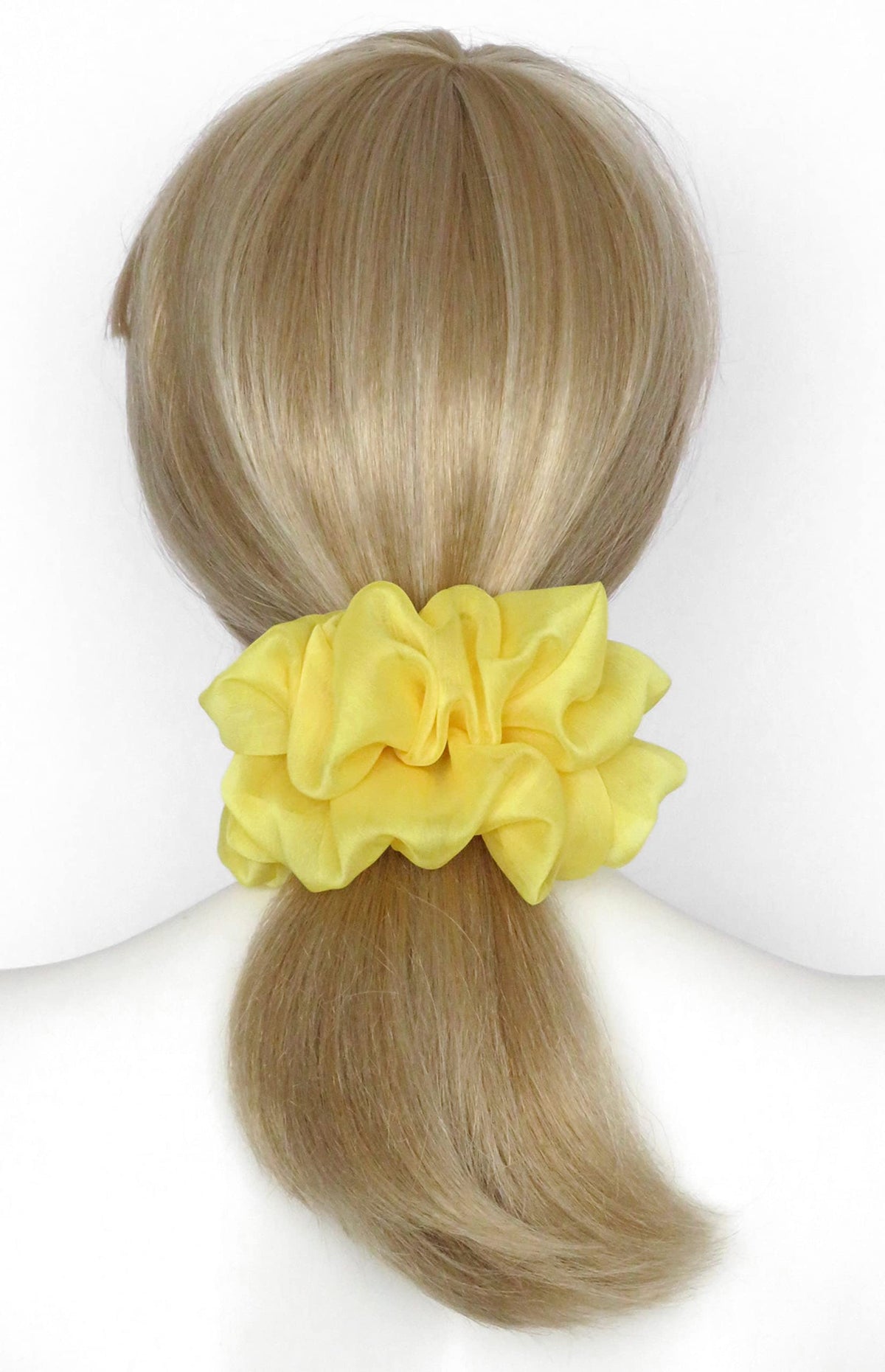 AnnushkaHomeDecor scrunchie displayed in clear box with silver ribbon