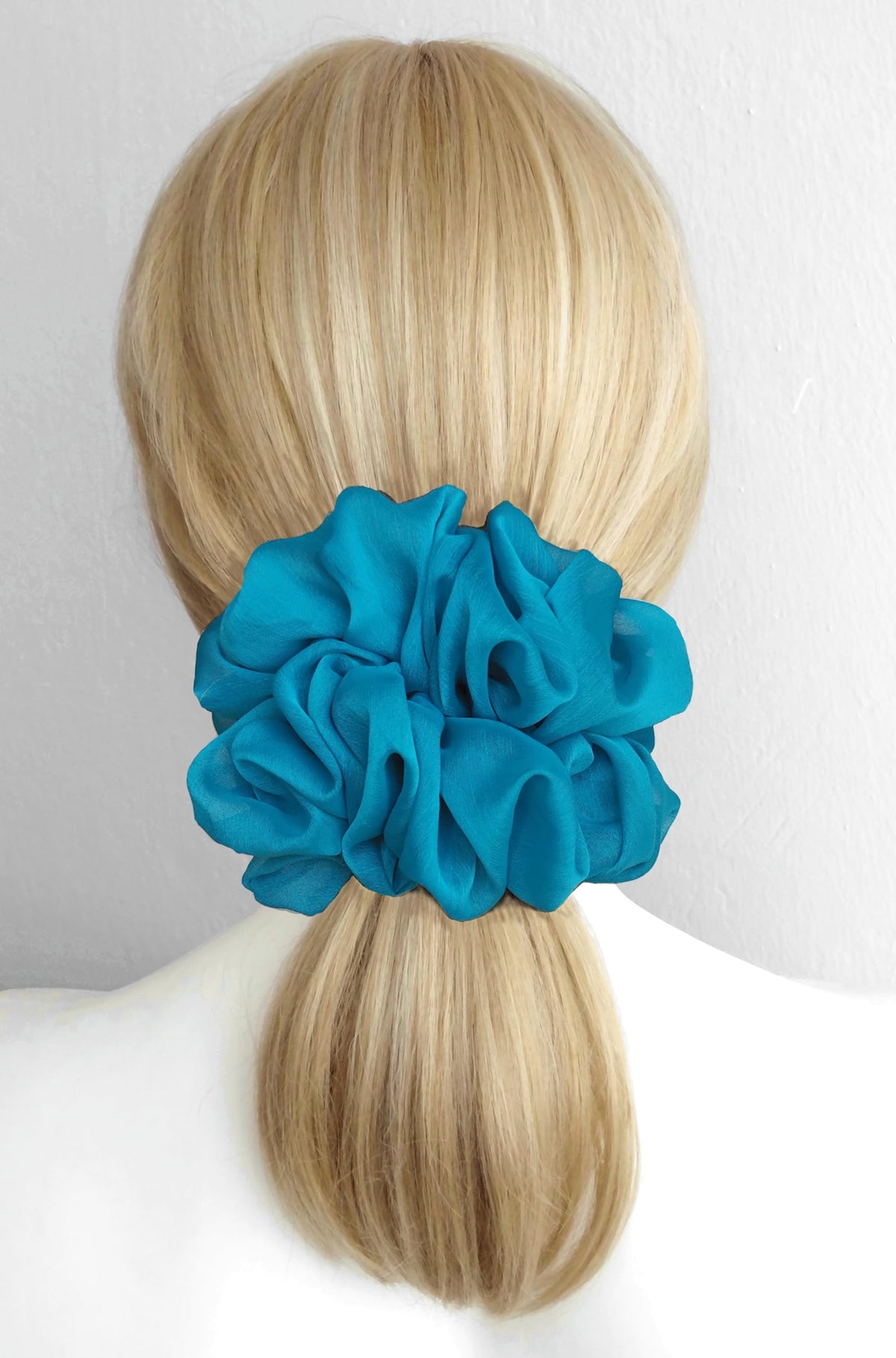 AnnushkaHomeDecor scrunchie showing soft texture and sheen