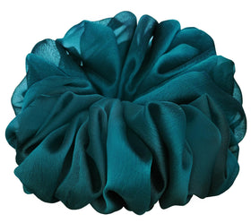 AnnushkaHomeDecor scrunchie worn as a wrist accessory