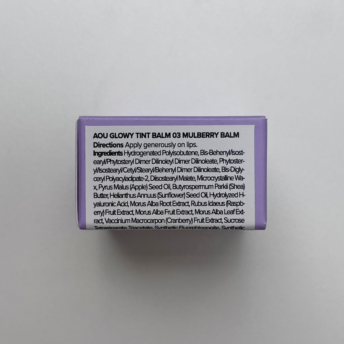 AOU GLOWY TINT BALM Mulberry open with product visible