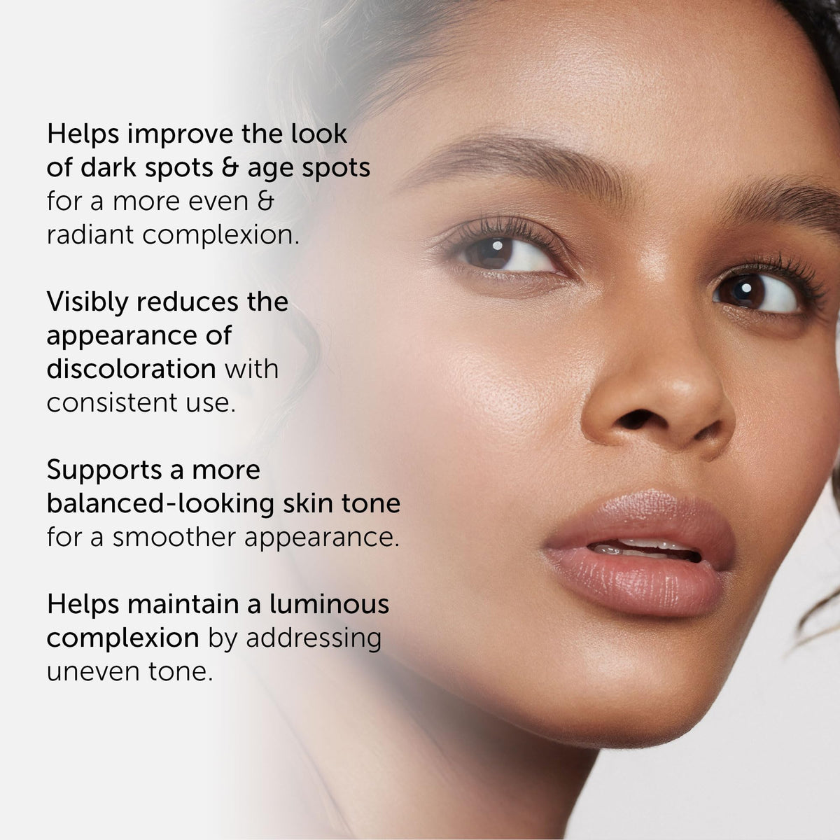 Application of 111SKIN Dark Spot Correcting Serum on face