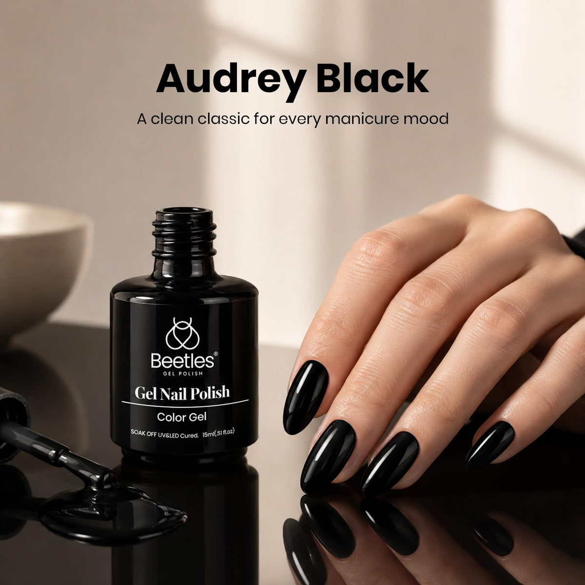 application of beetles Gel Polish Audrey Black on nails