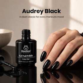 application of beetles Gel Polish Audrey Black on nails