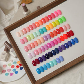 Application of GAOY gel polish on nails with UV lamp