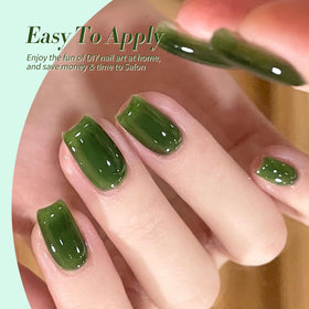 Application of jelly green gel polish on nails