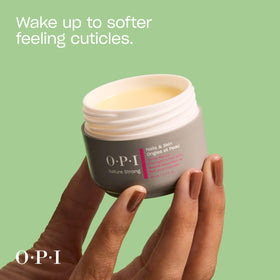 Application of OPI Nature Strong Cuticle Balm on hands