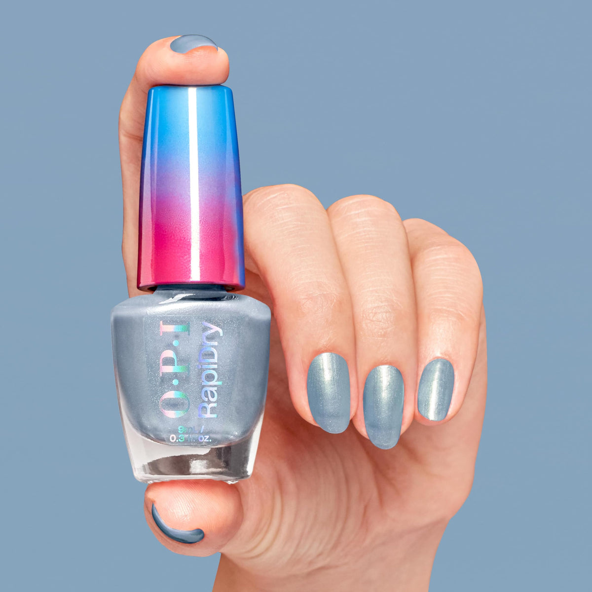 Application of OPI RapiDry Soft Blue Metallic Nail Polish on nails